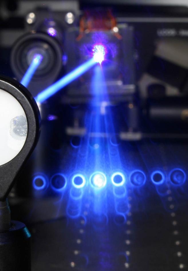 Laser beams produced photons in the University of Vienna triple entanglement experiment
