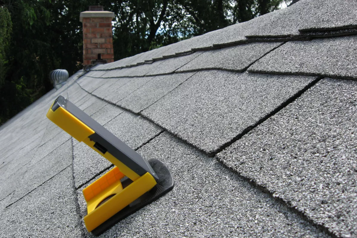 This is what you do when you're testing solar-powered gadgets in a tree-filled neighborhood – you put 'em on the roof