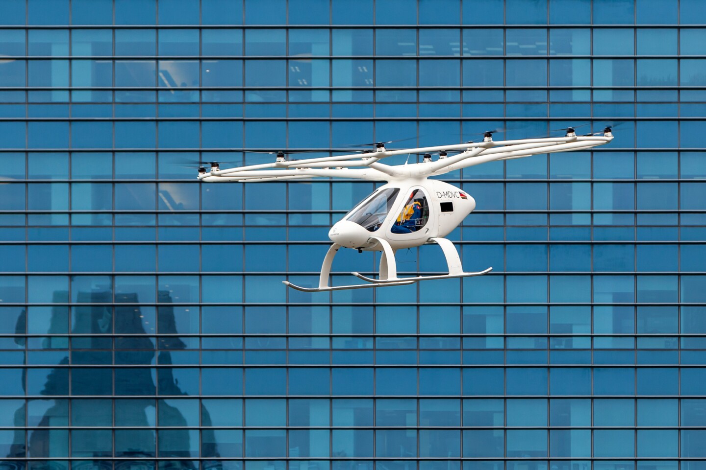A pilot was onboard and controlling the Volocopter 2X through the air using a joystick during Tuesday's test flight, although the vehicle is designed to eventually fly on its own