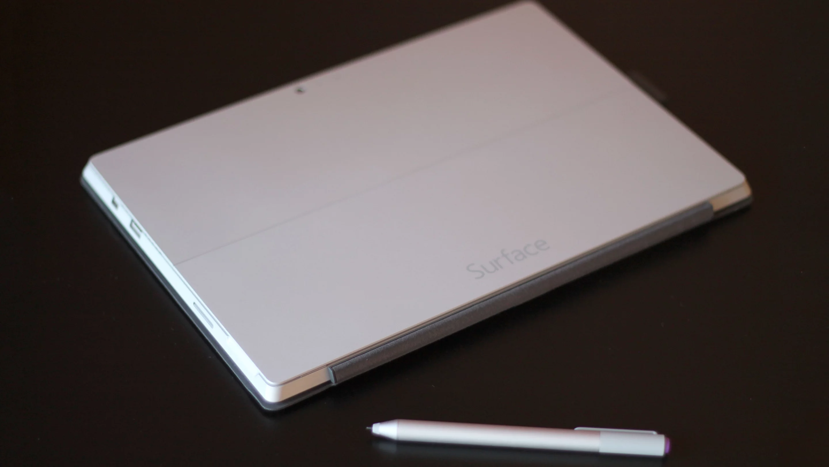 It's the same magnesium build, only lighter, thinner and silver-colored