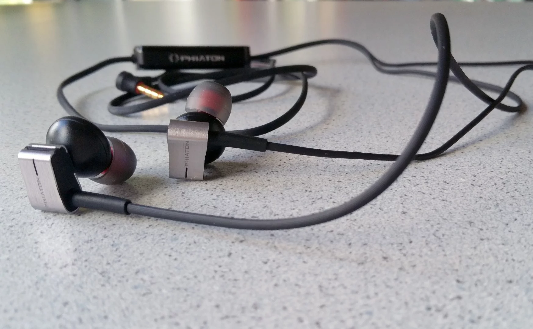 The Phiaton PS 202 NC combines what we love from cabled earphones with the power of active noise cancellation