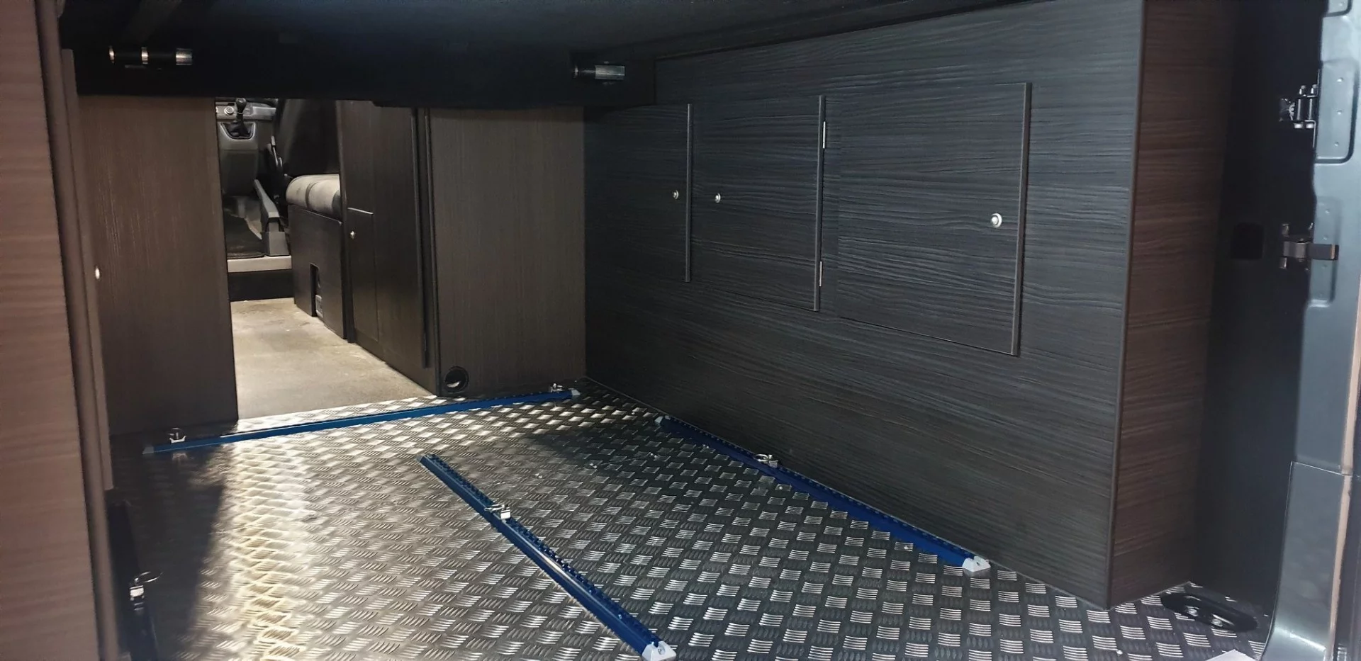 Tie-down tracks make it easy to secure bikes and other cargo