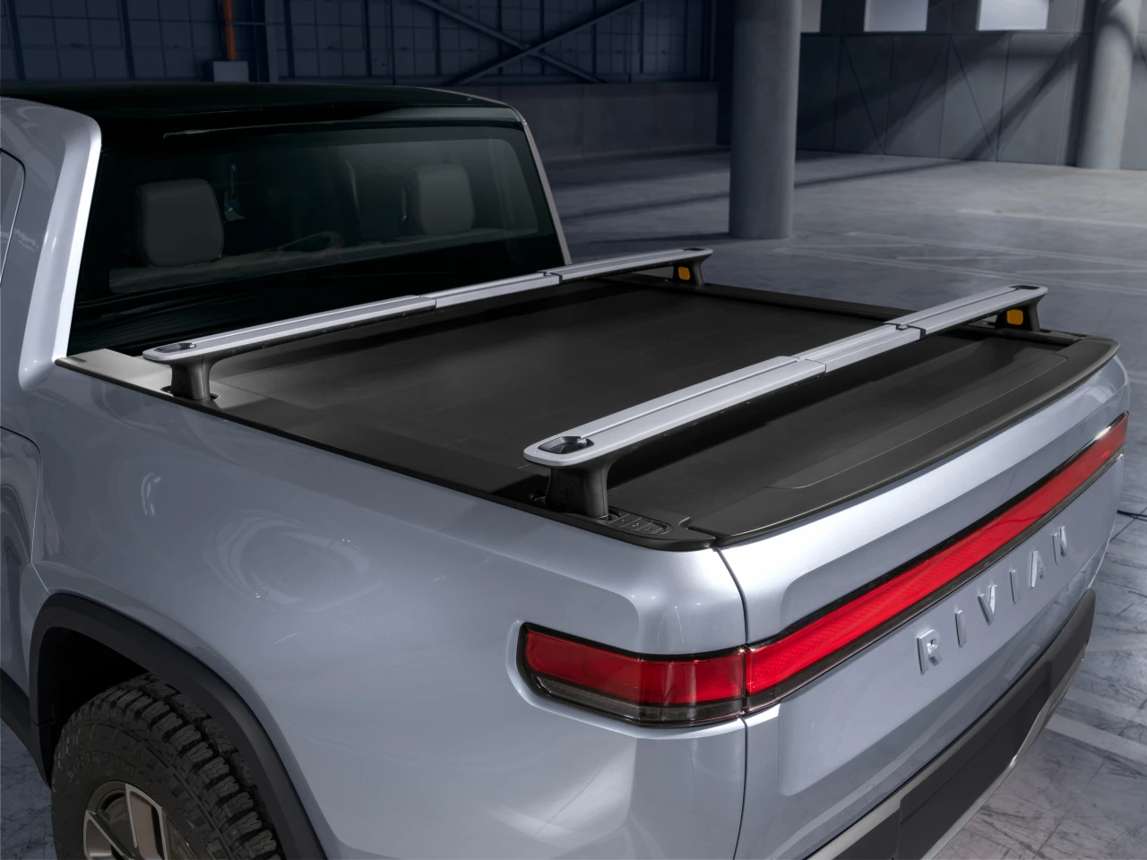 Rivian has developed a telescoping rack for use on/in the bed or roof