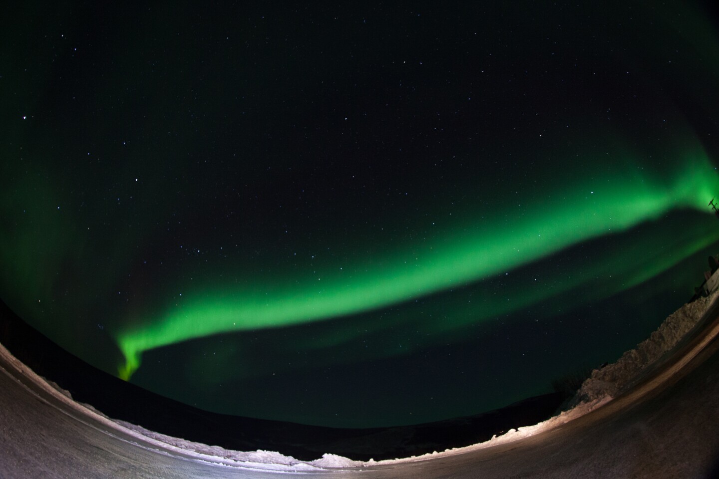 An aurora is one of the effects of solar particles interacting with Earth's atmosphere (Photo: NASA)