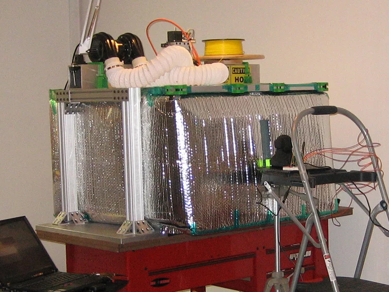 The latest upgrade to the home-built, large-scale 3D printer, with new heater build chamber