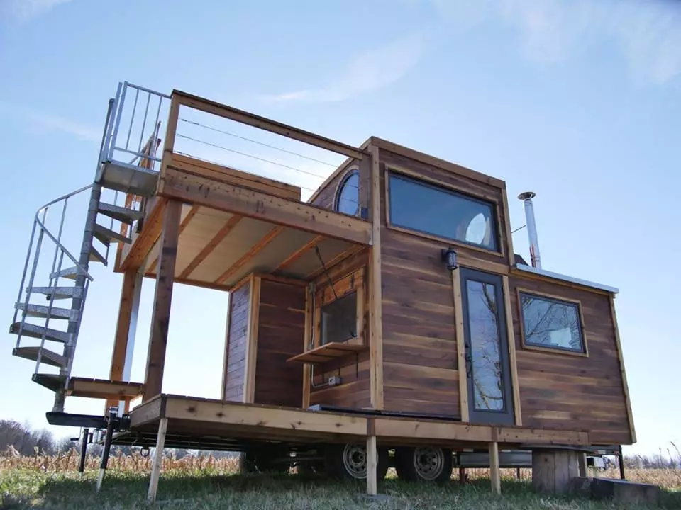 Carpenter Owl has installed a folding table that seats four on the Honey on the Rock's upper deck, which is also home to an outdoor tub