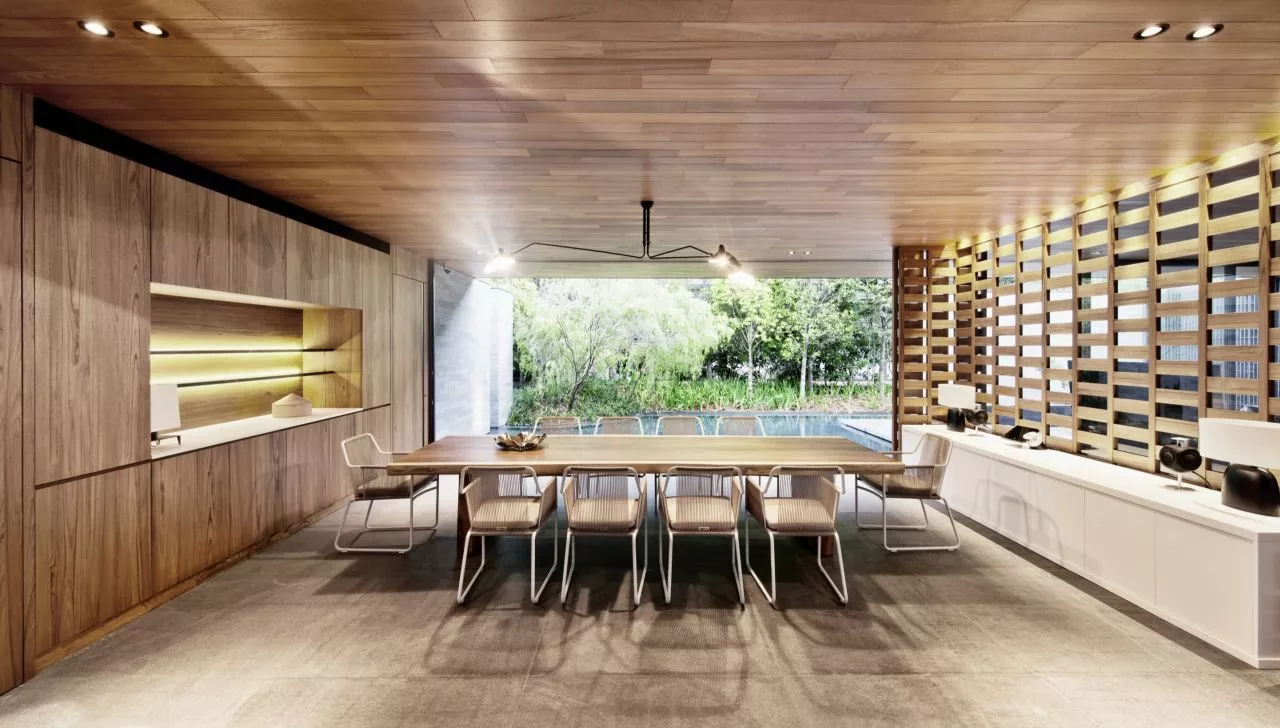 The slightly smaller upper floor has just one bedroom, but also features a study, gym, and water feature Photo: Bryan van der Beek and Edward Hendricks)