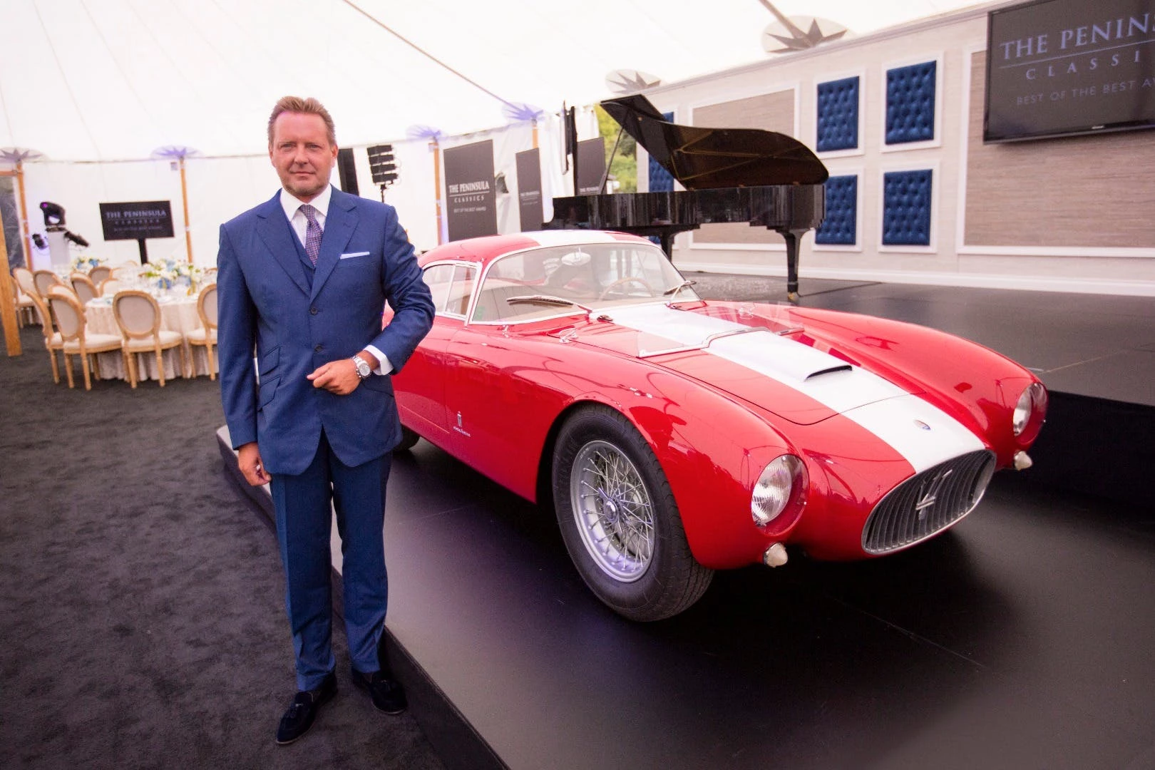 The winner of the 2016 Concorso d'Eleganza Villa d'Este, this 1954 Maserati A6GCS Berlinetta won the Peninsula Classics Best of the Best Award for 2016 at the 2017 Monterey Car Week. Pictured with the car is Timm Bergold, a representative of Monaco-based Destriero Collection.