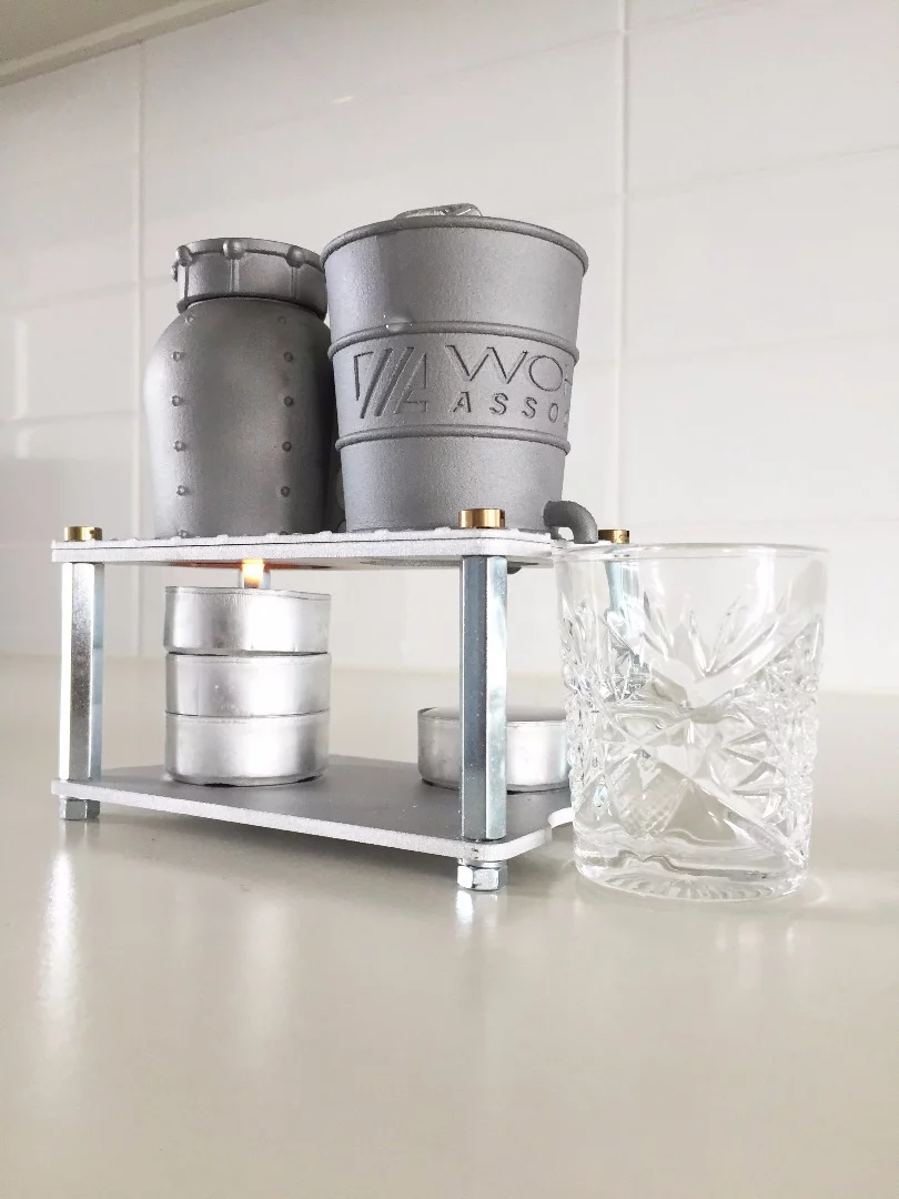 The tea light didn't produce enough heat to make the iStill work, so was replaced by a white spirit burner from a fondue set