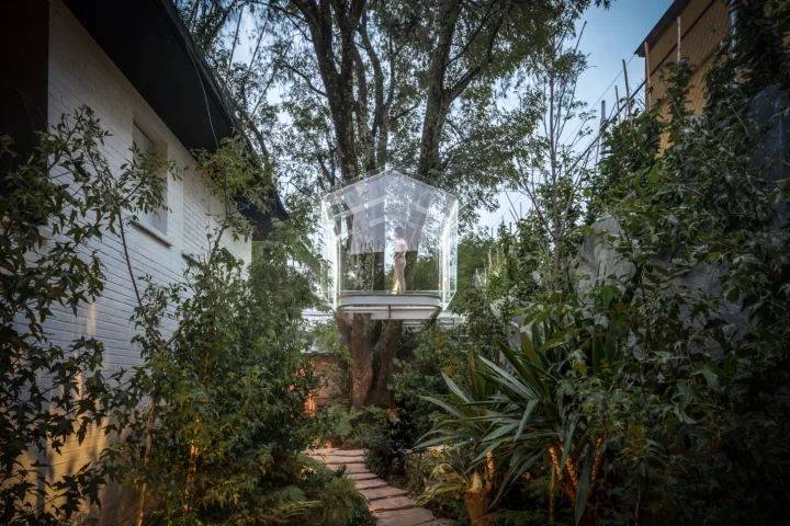 A glass treehouse mightn’t be everyone’s idea of a secret childhood hideaway