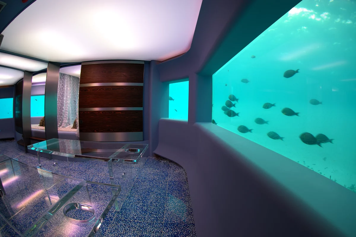 Visitors enter the submarine spa via an underwater corridor