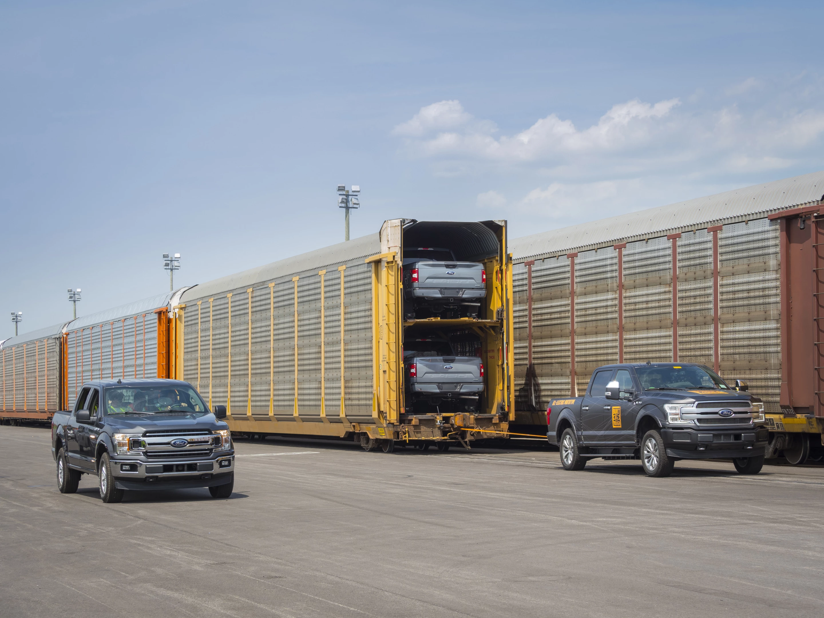 Ford previously teased the towing capabilities of the electric F-150, showing a prototype pulling more than 1 million pounds worth of truck-loaded double-decker rail cars