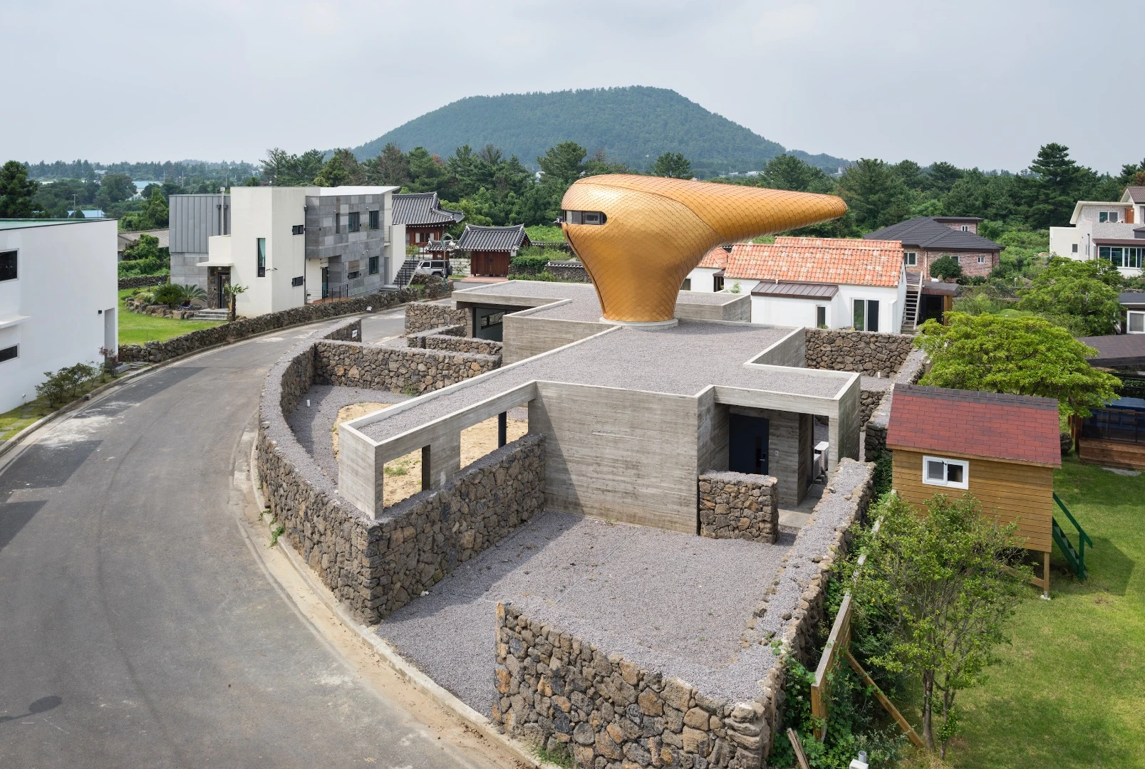 Volcanic rock was used to blend in with the local architecture