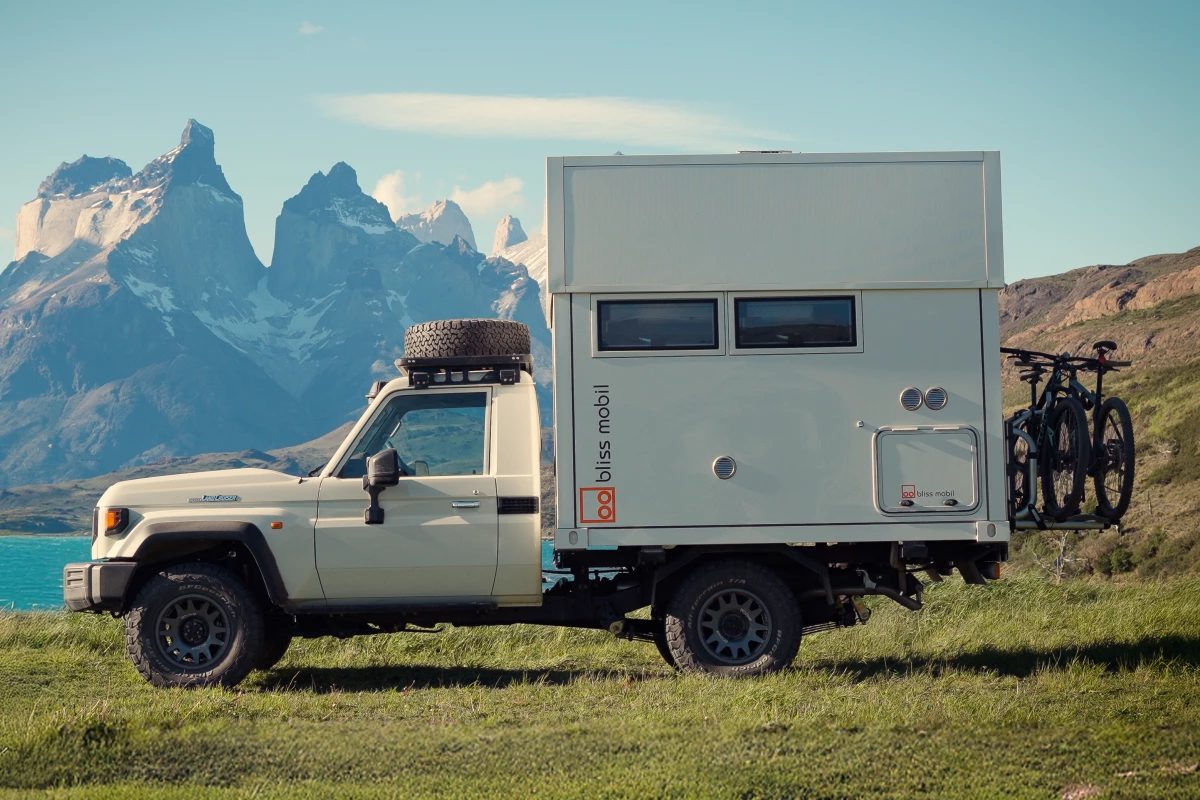 The 8-foot Bliss Mobil expedition module raises its roof to make camp