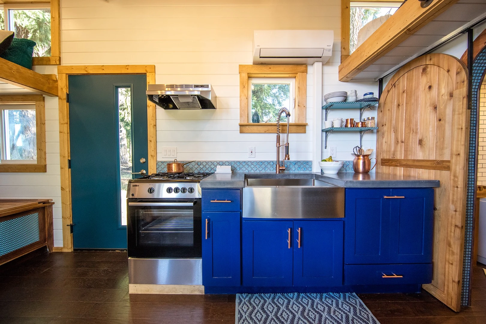 Access to the Tiny Adventure Home is gained by a standard front door