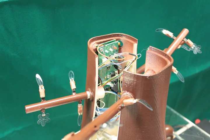 The PLANTOID robot, with its "trunk" and sensor/leaf-bearing branches
