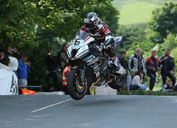 Michael Dunlop gets airborne on his BMW S1000RR