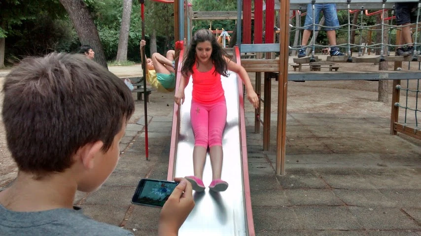 Hybrid Play fuses playground time with mobile games by turning swings and slides into game controllers