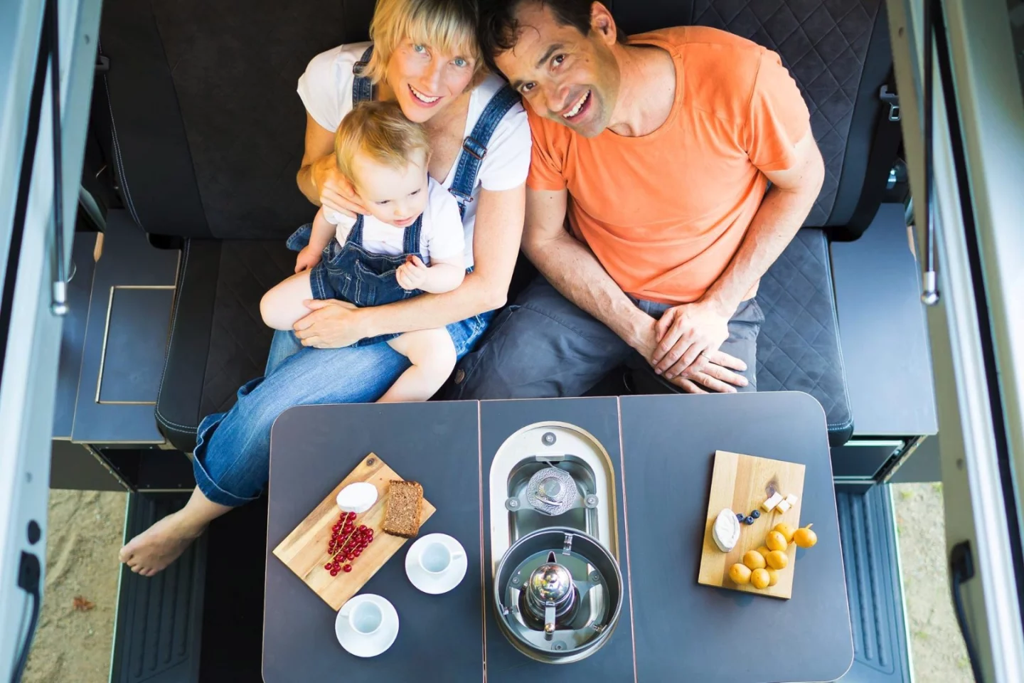 A key feature of the SpaceCamper LightOpen is the removable, folding table with integrated two-burner stove