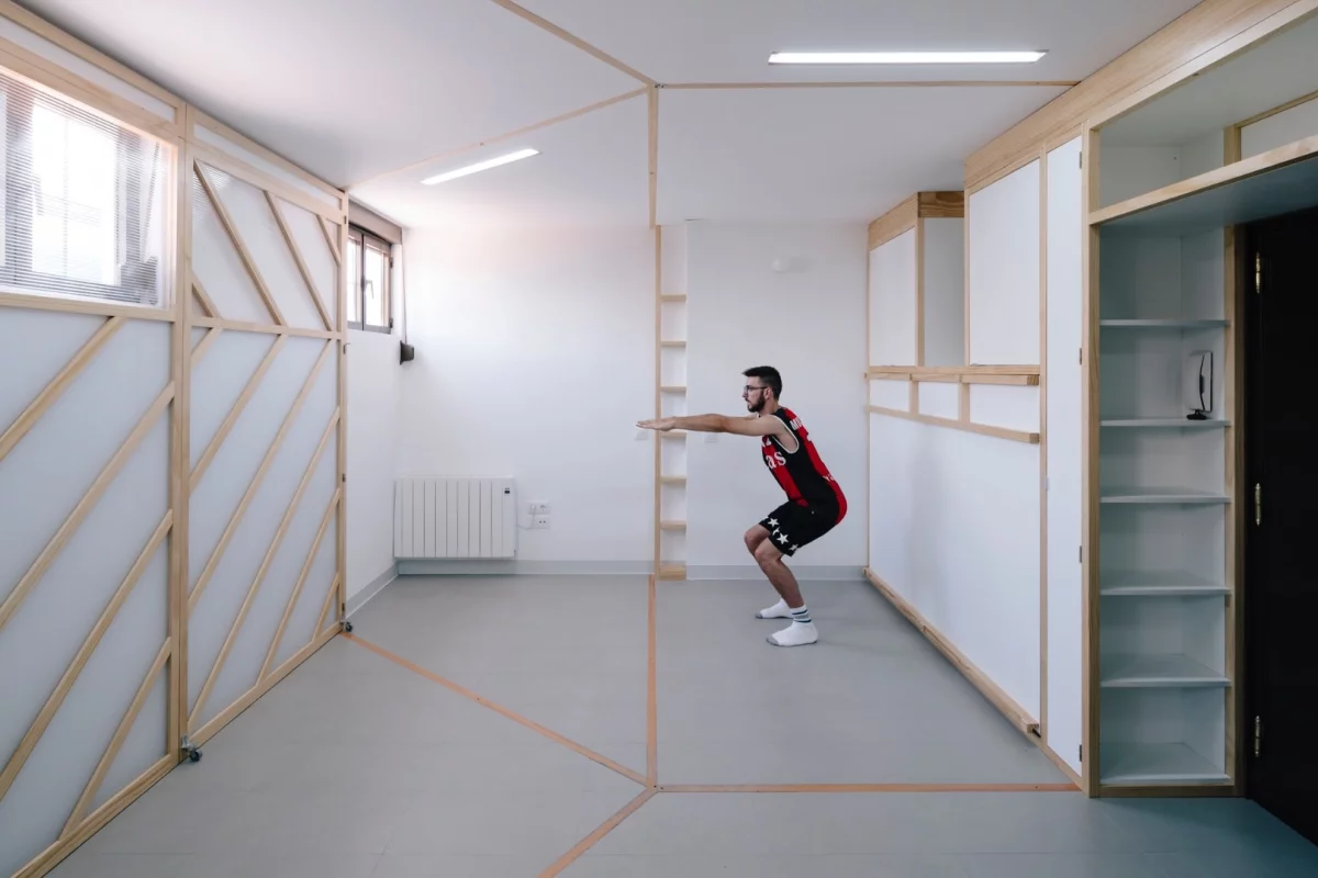 Markings on the floor show where the hinged wood and perspex screen can be placed