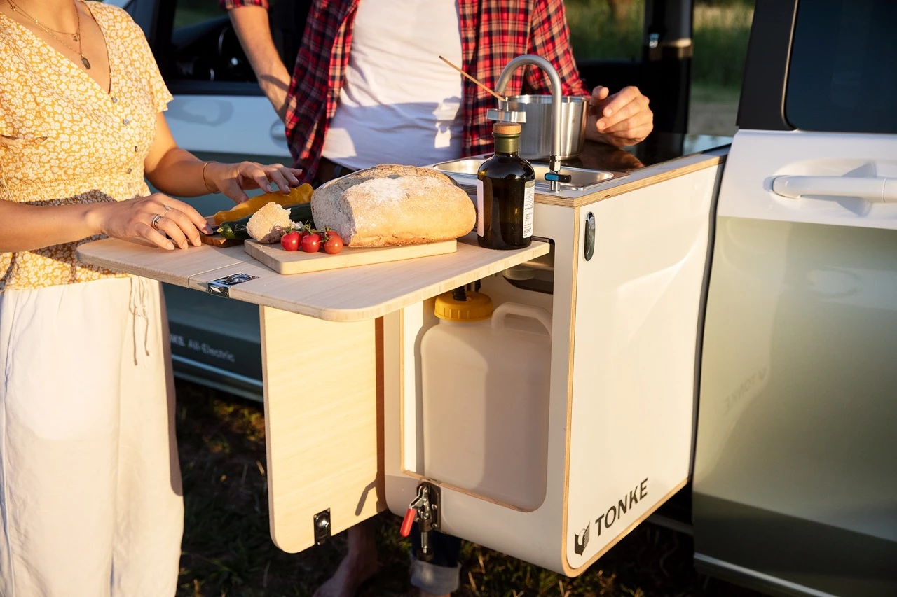 Pictured here on the Mercedes EQV Touring, Tonke's swivel kitchen is a gathering space for inside and outside