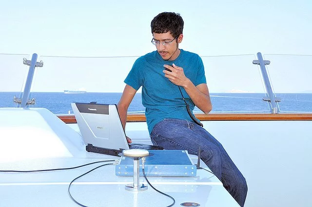 Jahshan Bhatti operates the spoofing hardware aboard the White Rose (Photo: UTexas at Austin)