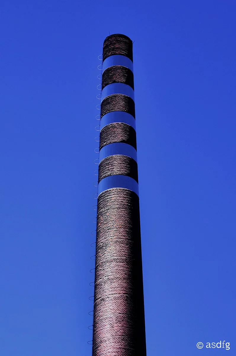 Glance up at the tower and the you will be met by the disarming sight of alternating floating and missing sections of chimney stack (Photo: asdfg)