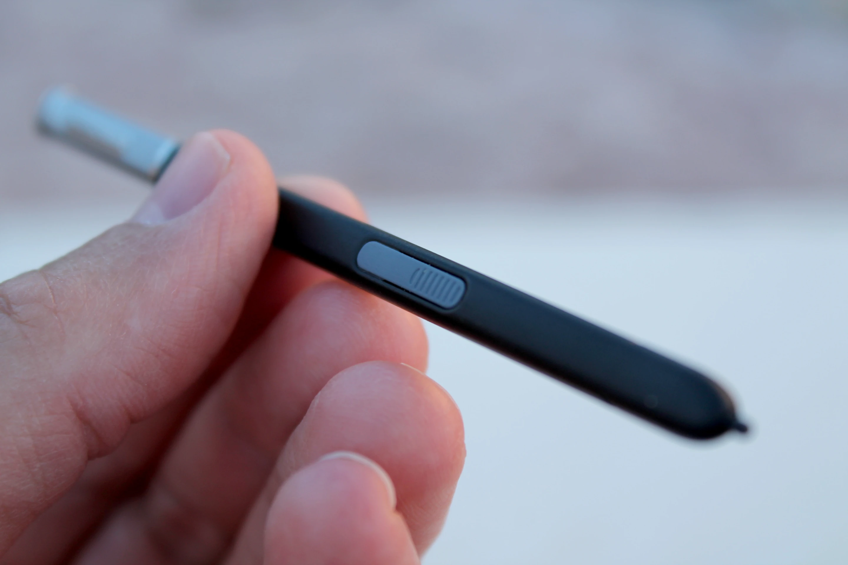 The S Pen has a lone button on its side, used for activating Air Command