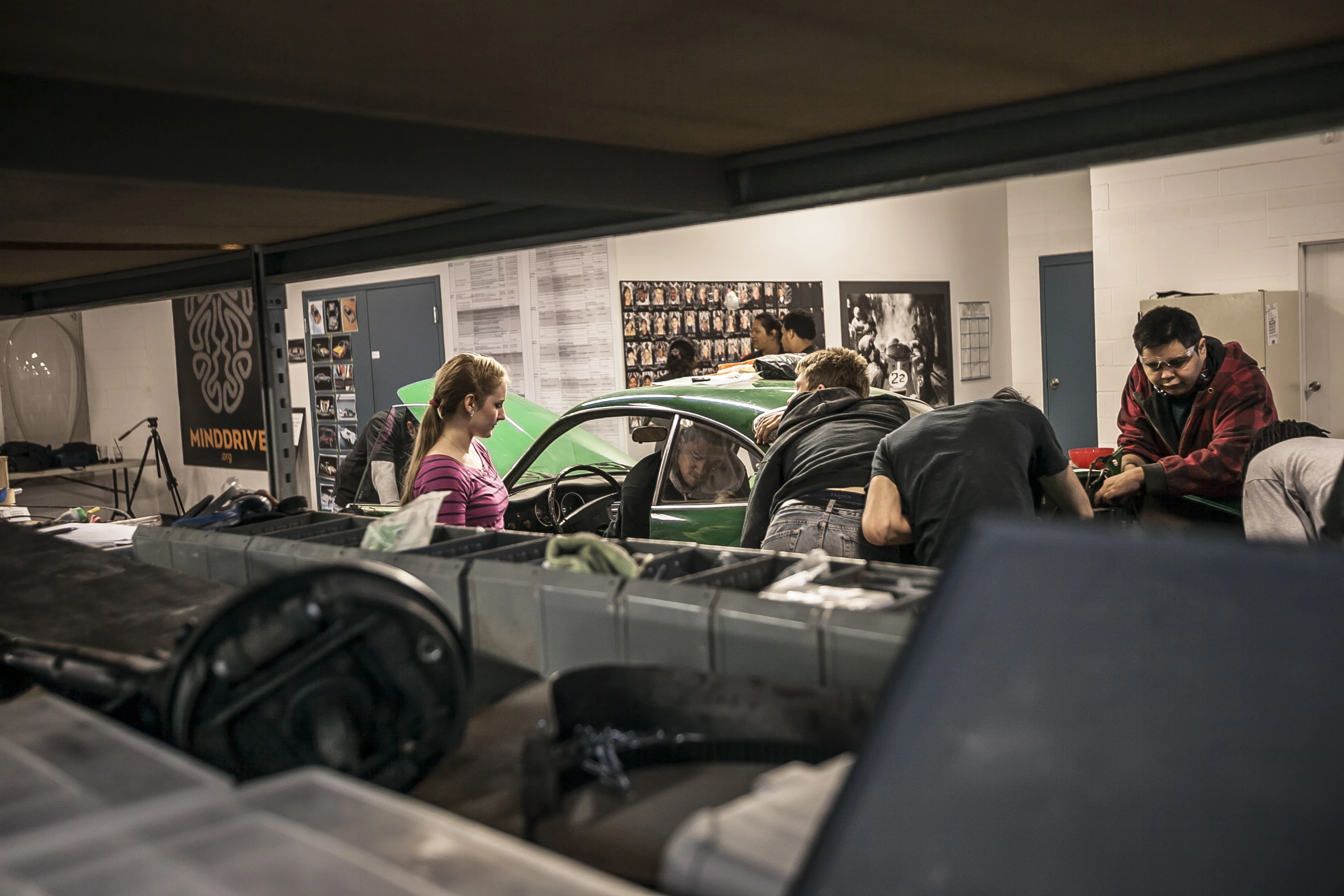 The Minddrive students working on the 1967 VW Karmann Ghia