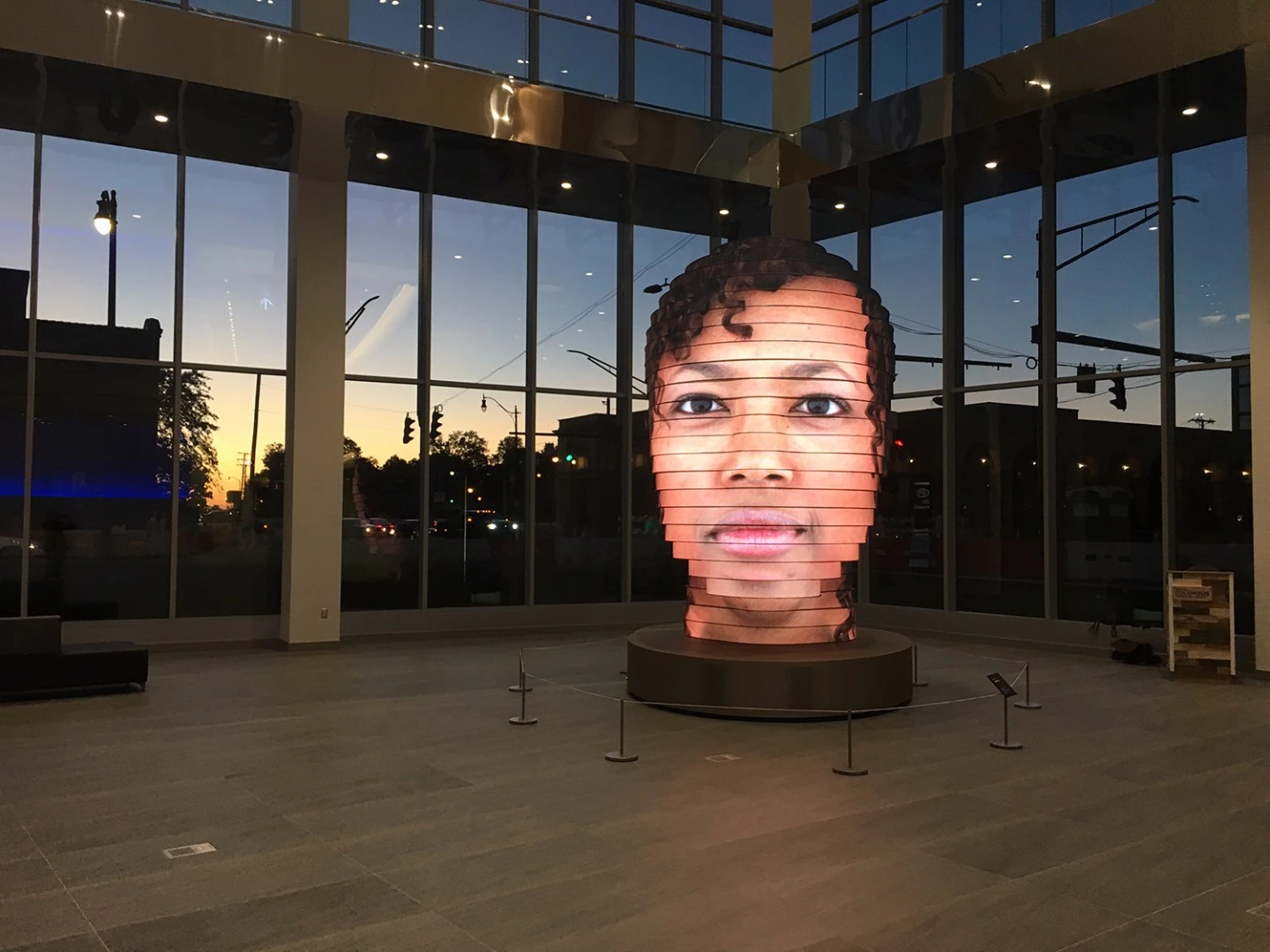 The giant head stands 14 ft (4.3 m) tall and is made up of ribbons of ultra-bright LED screens