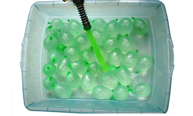 The balloons are already tied, so when they're full you simply shake them out to seal them ready for throwing