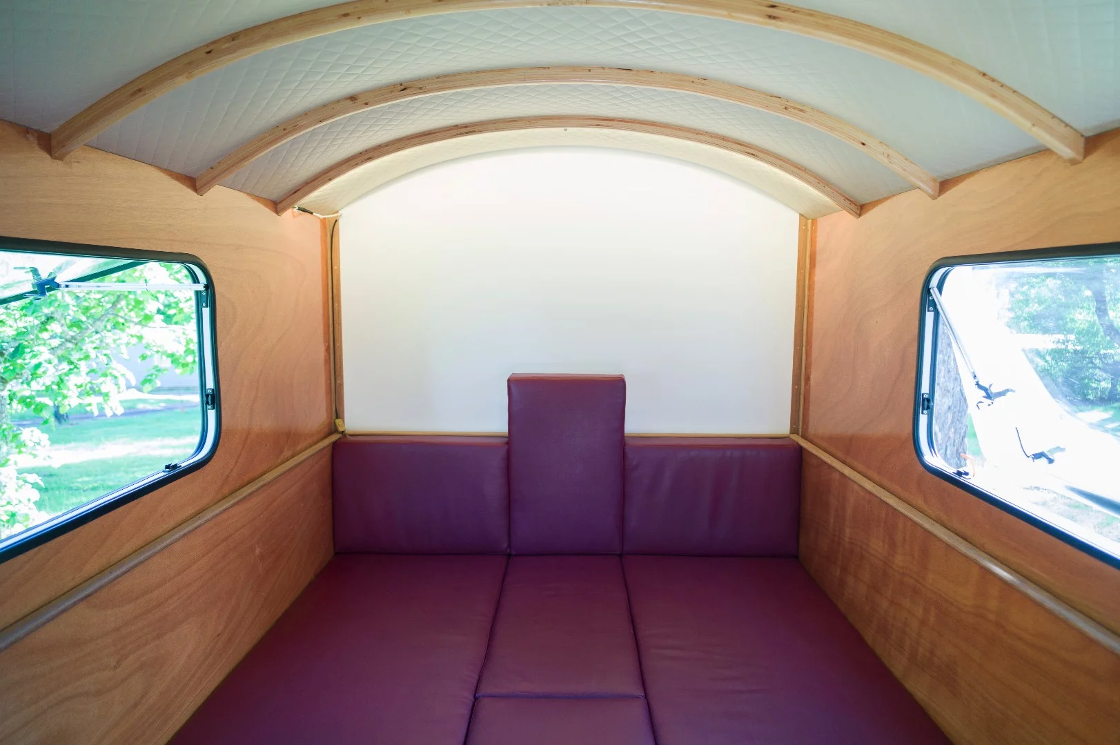 The curved ceiling helps to optimize space and provide a more aesthetic look