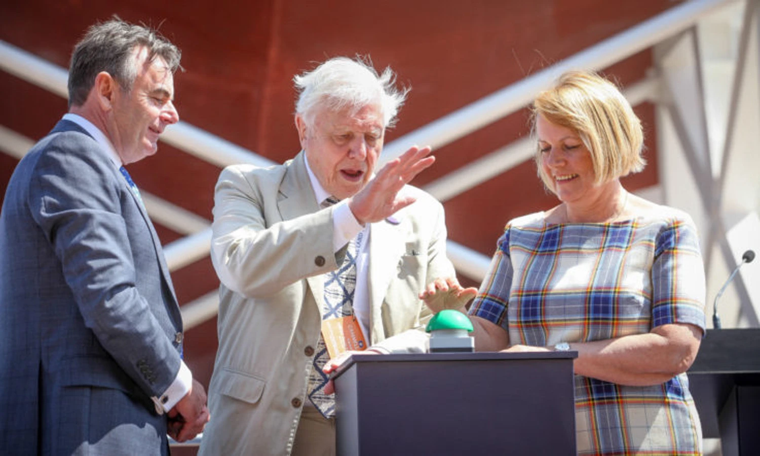 (From L to R) Cammel Laird Chief Executive John Syvret watches Sir David Attenborough and BAS Director Dame Jane Francis push the launch button