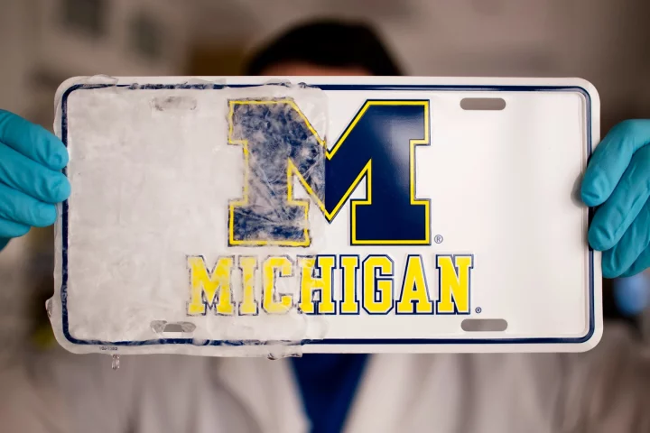 The right half of this licence plate was treated with the new coating
