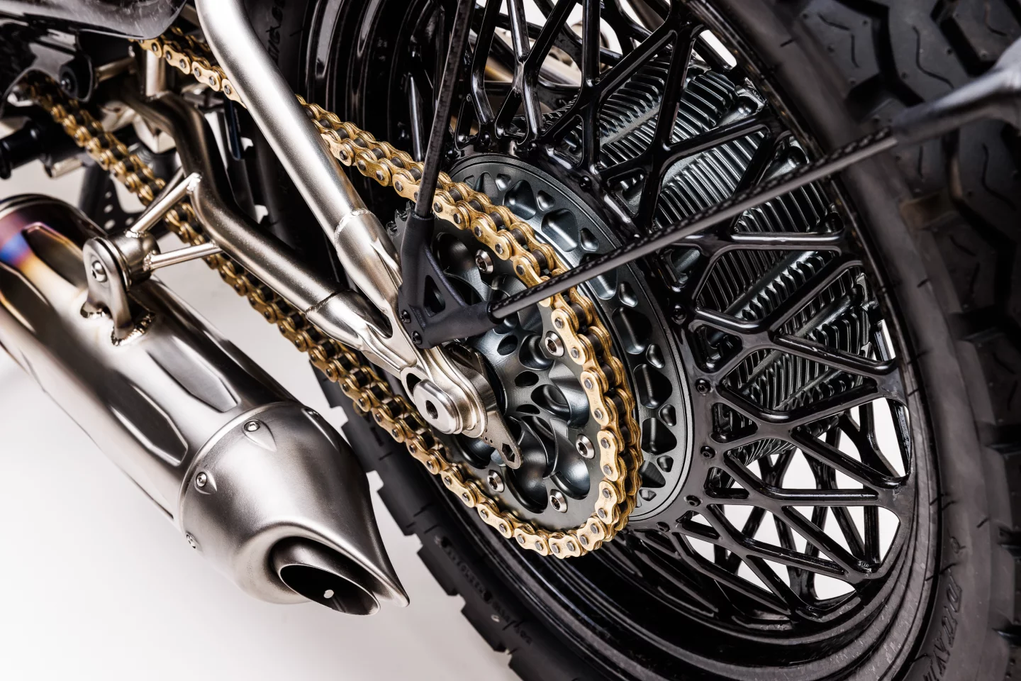 Ye gods, look at those handmade carbon rims and the titanium exhaust