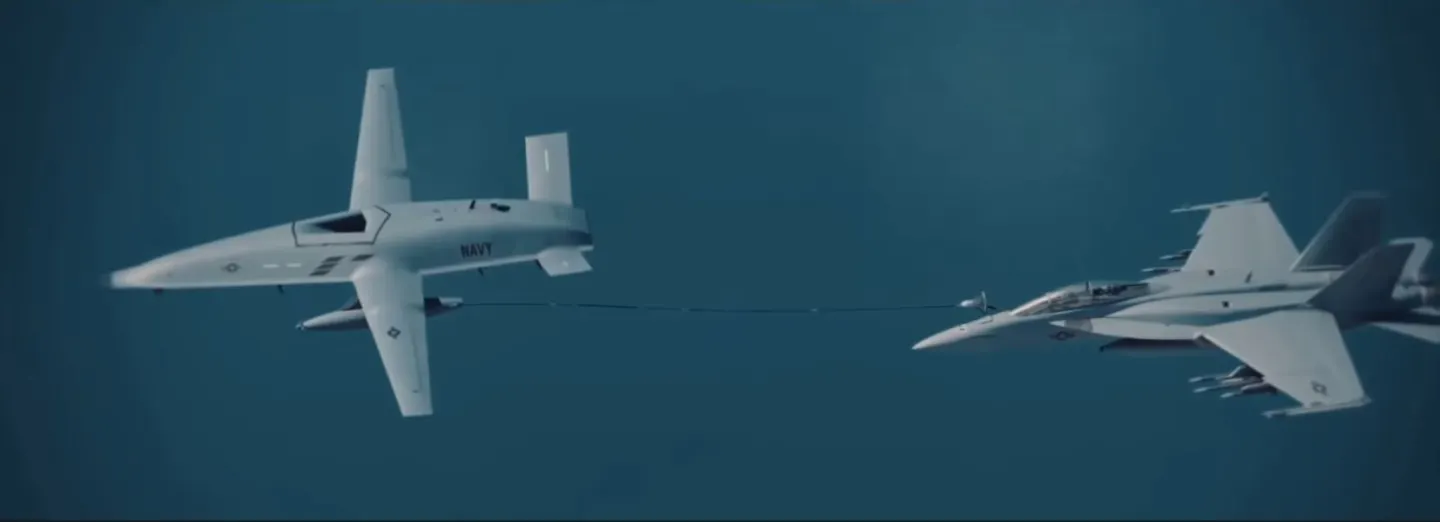 Artist's rendering of the MQ-25 (left) in operation