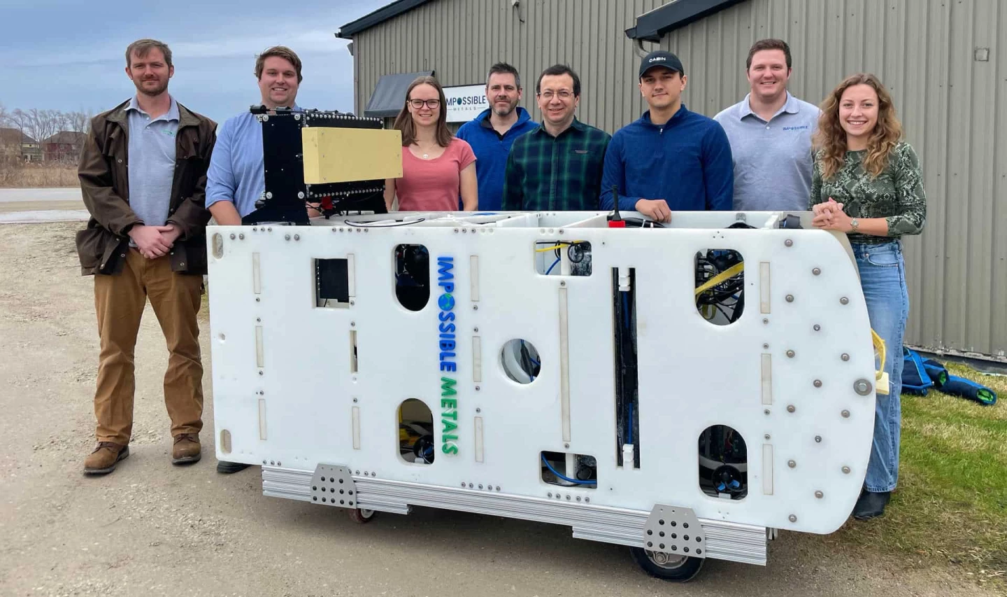 The Impossible Metals team with its proof-of-concept Eureka prototype