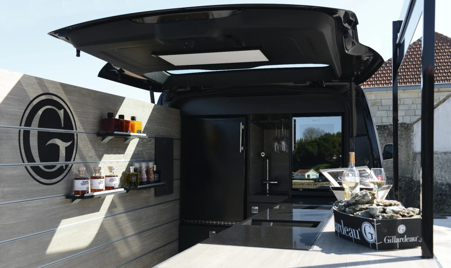 The "La Marcelle" includes a bar, a worktop, a display wall, a refrigerator, a sink and more