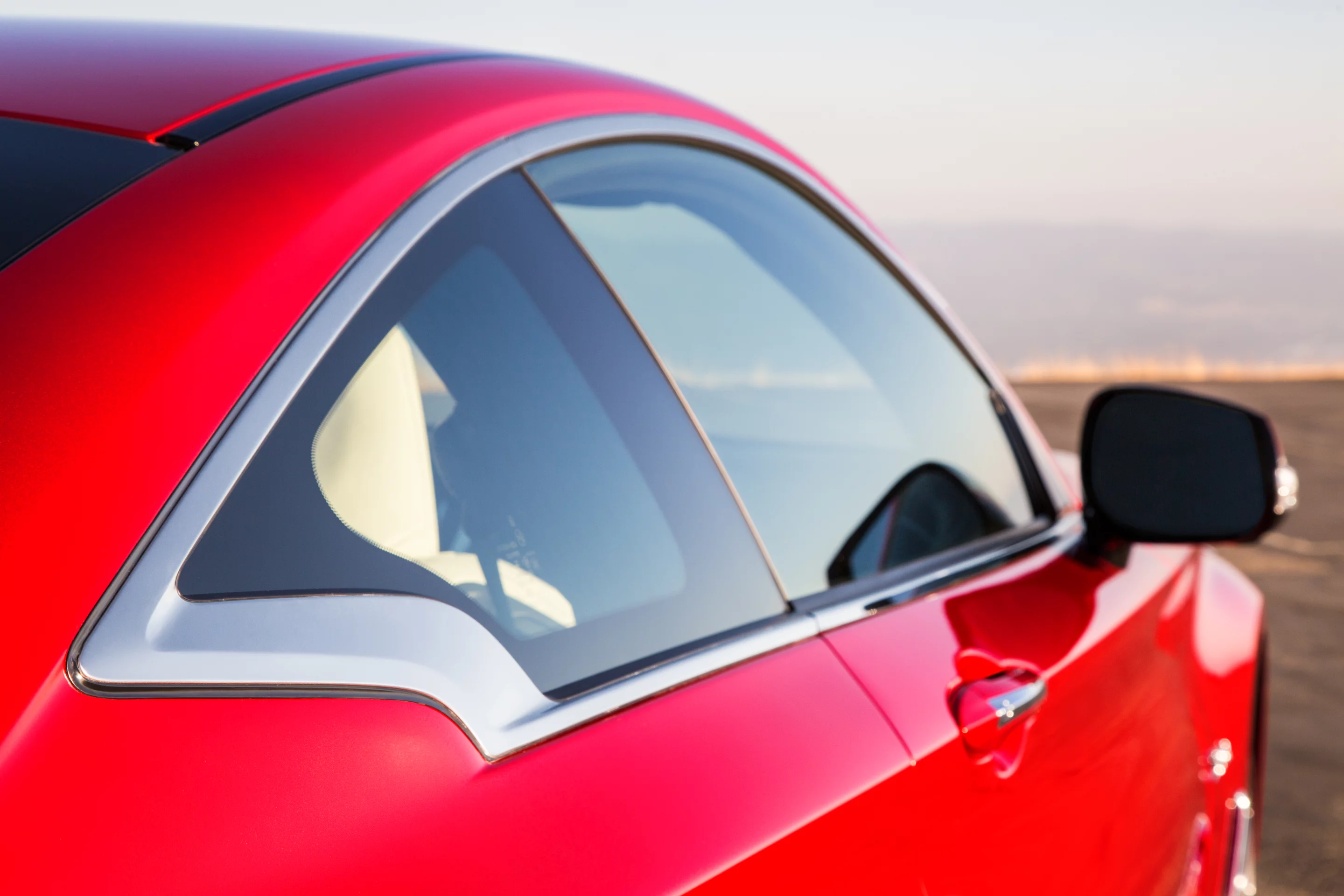 The curvature of the "Euro blurge" on the Q60 is a mimic of the car's overall signature