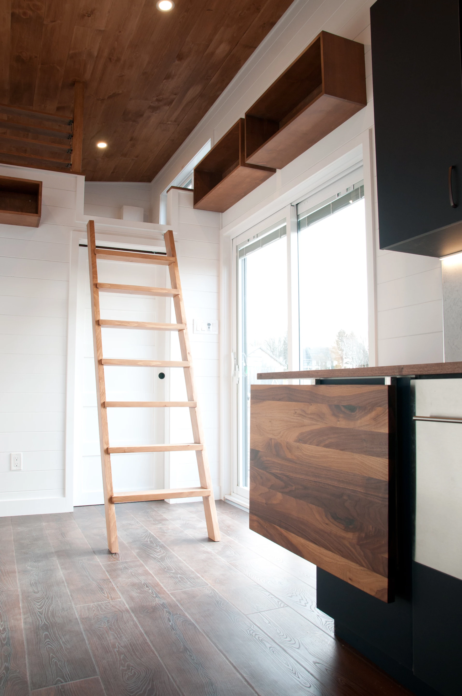 The Charme V2's secondary bedroom is reached by removable ladder