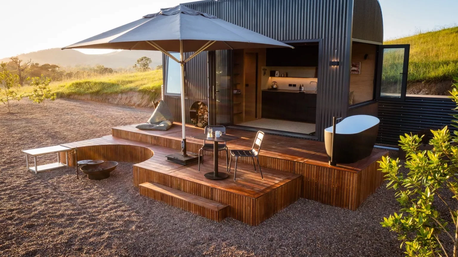 The Fowler & Ward x Base Cabin has an optional deck with an outdoor bathtub and seating area
