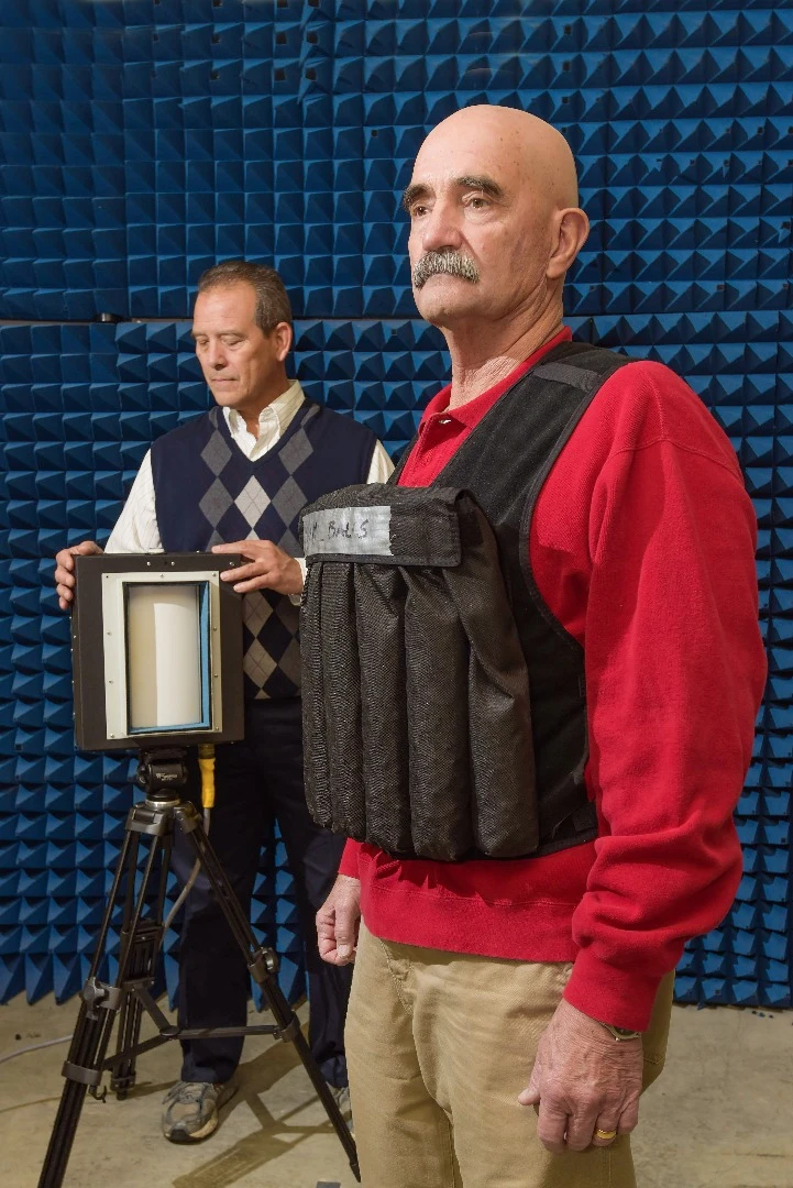 The CBD-1000 bomb detector (left) is trained on a mock suicide vest