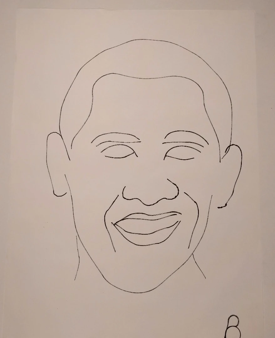 This simple portrait of US President Barack Obama was created by a LEGO-based robot that rolled around on the paper