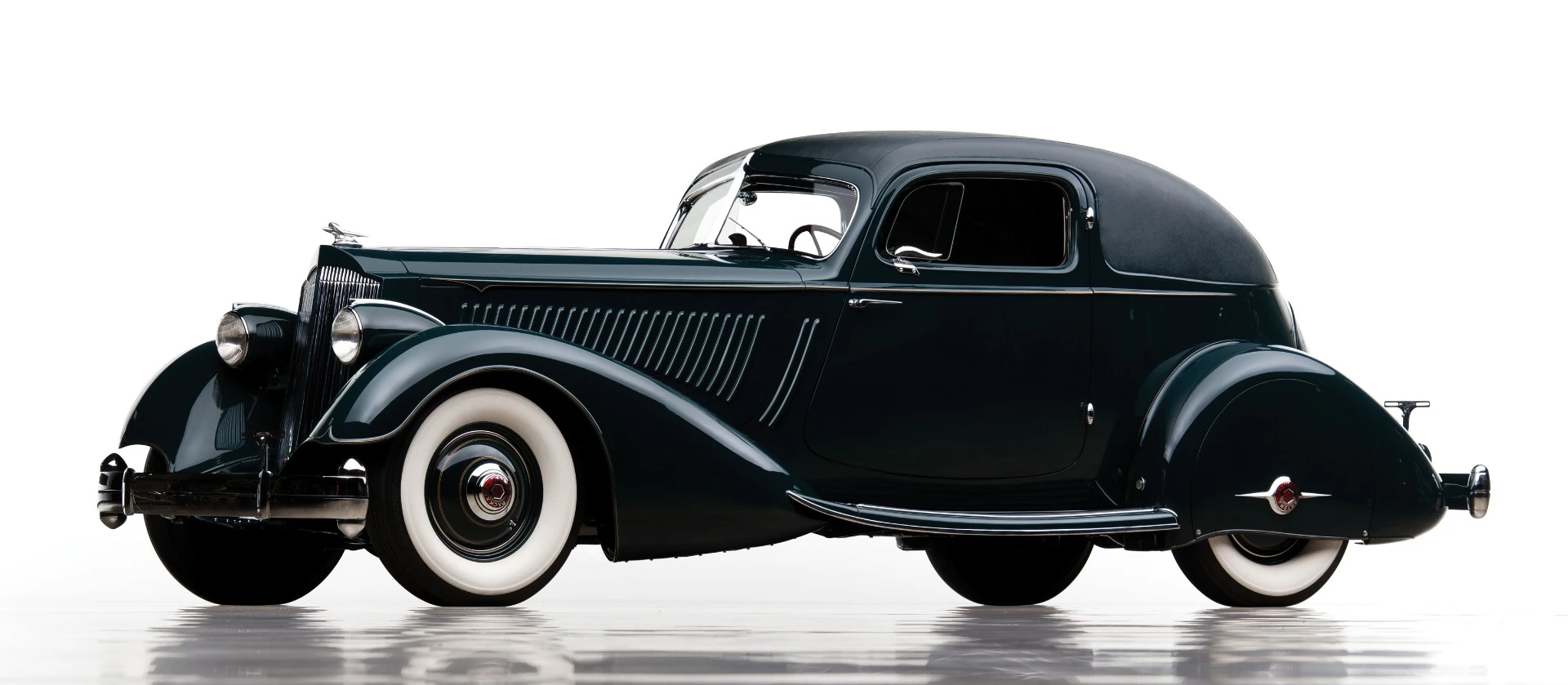<p>This 1934 Packard Twelve Sport Coupe by LeBaron (Lot 221) is the last of just four built, and was the 1934 New York Show car. Having been such a significant car in Packard's history, the car has a complete history from new and has been in many prominent collections at different times during it's eighty year existence.</p><p>Restored in the early 1980s, it won a 1983 AACA National First Prize badge and a CCCA National First Prize badge. <span>This highly regarded Sport Coupe is also featured in Hugo Pfau’s The Custom-Bodied Packard, Dennis Adler’s Packard, Beverly Rae Kimes’s Packard: A History of the Motor Car and the Company, and Michael Lamm and Dave Holls’s A Century of Automotive Style. </span></p><p>Estimated at $1,600,000-$2,500,000, the Packard New York Sport sold for $2,200,000.</p>