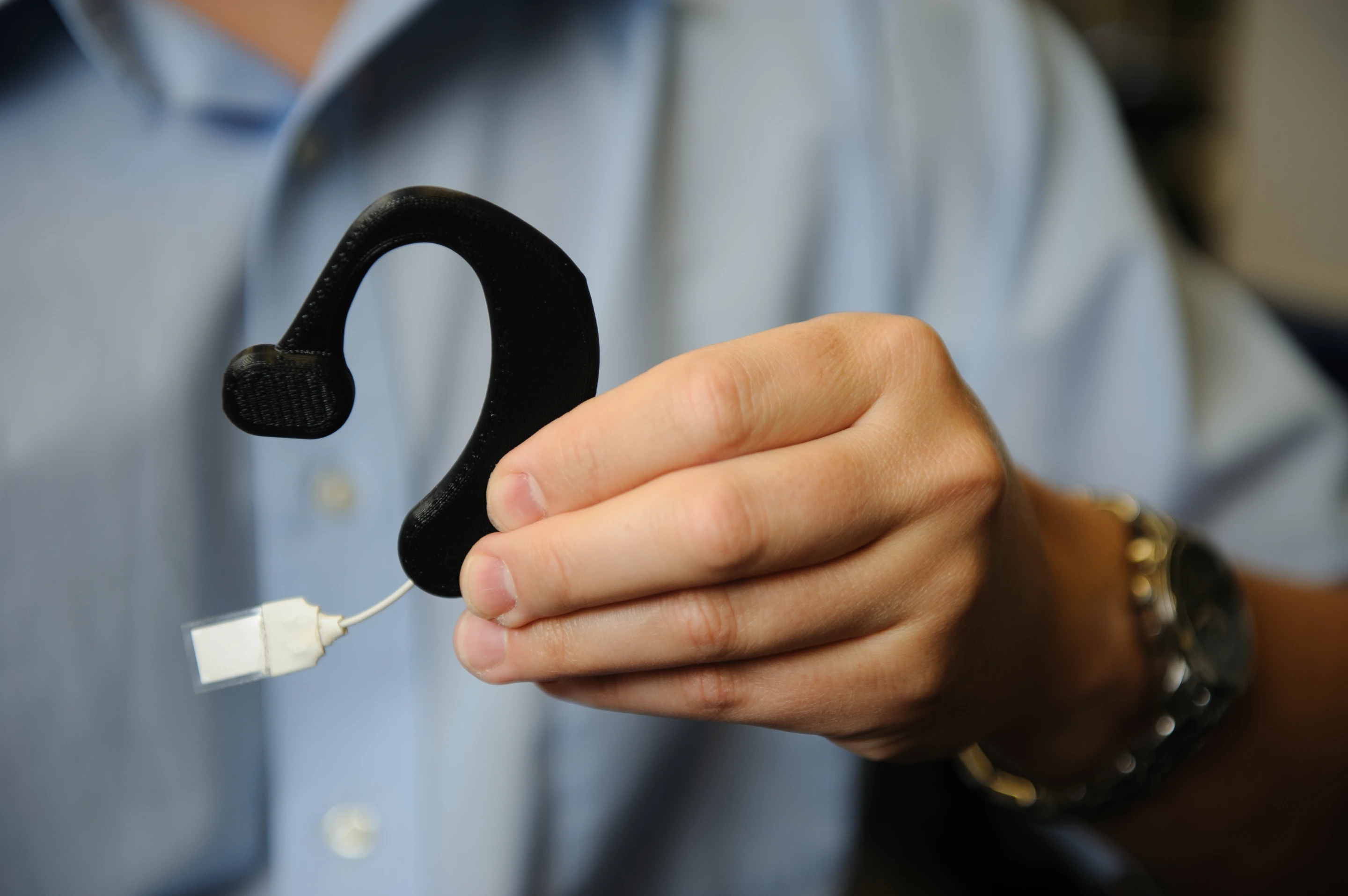 The prototype Automatic Ingestion Monitor with its motion sensor visible at the bottom, in white (Photo: University of Alabama)