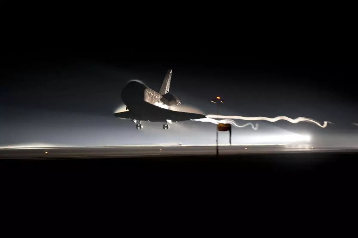 At 5:57 a.m. EDT on July 21, 2011, space shuttle Atlantis landed for the final time at NASA's Kennedy Space Center (Photo credit: NASA/Kim Shiflett)