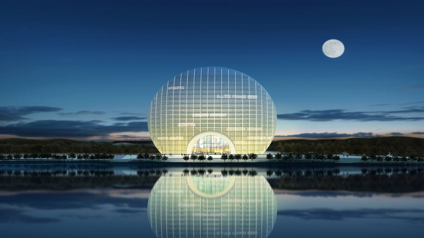 Yanqi Lake Kempinski Hotel designed to look like the sun rising over a lake