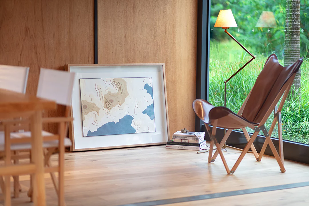 The wooden flooring, walls and furnishings add warmth to the space