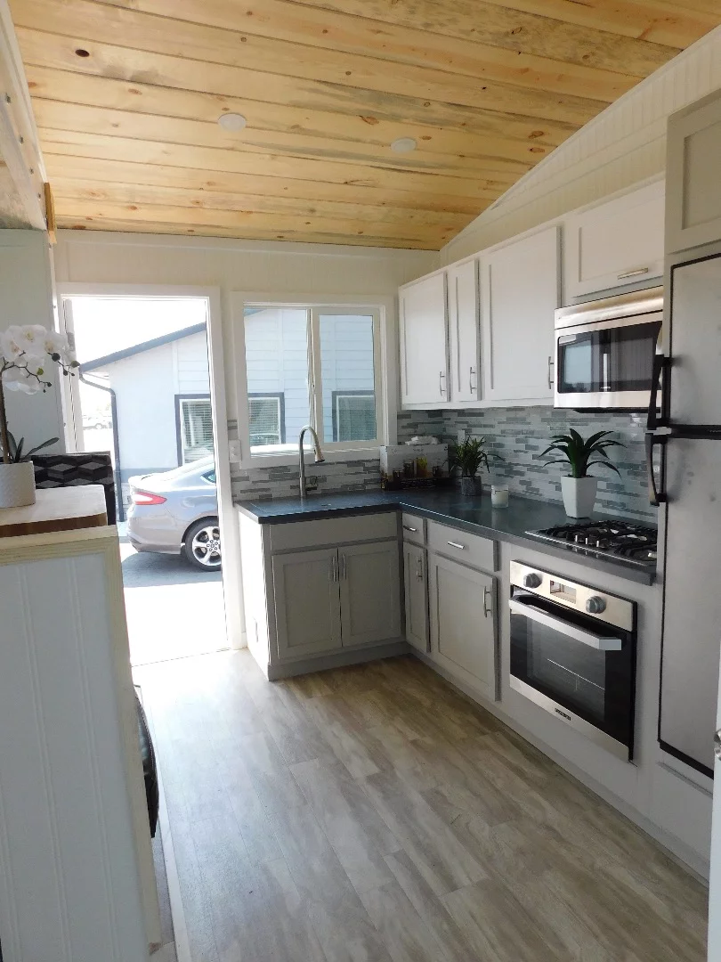 The Ozark's interior walls are finished in beadboard, with beetle kill pine ceiling and vinyl floor