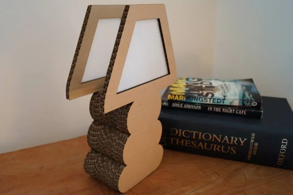 The Cover Lamp is a two-dimensional replica of a typical table lamp made from cardboard boxes retrieved from local stores